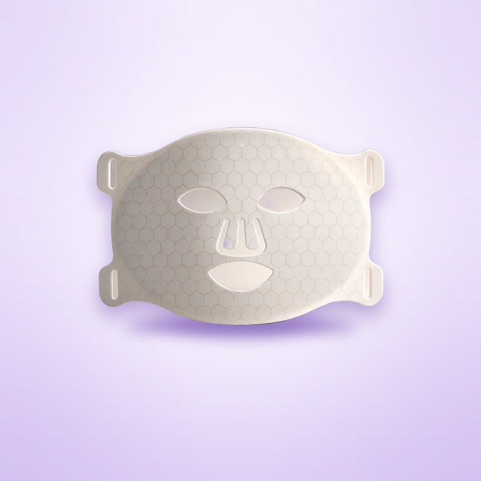 LED silicone face mask shown on a soft lavender background
